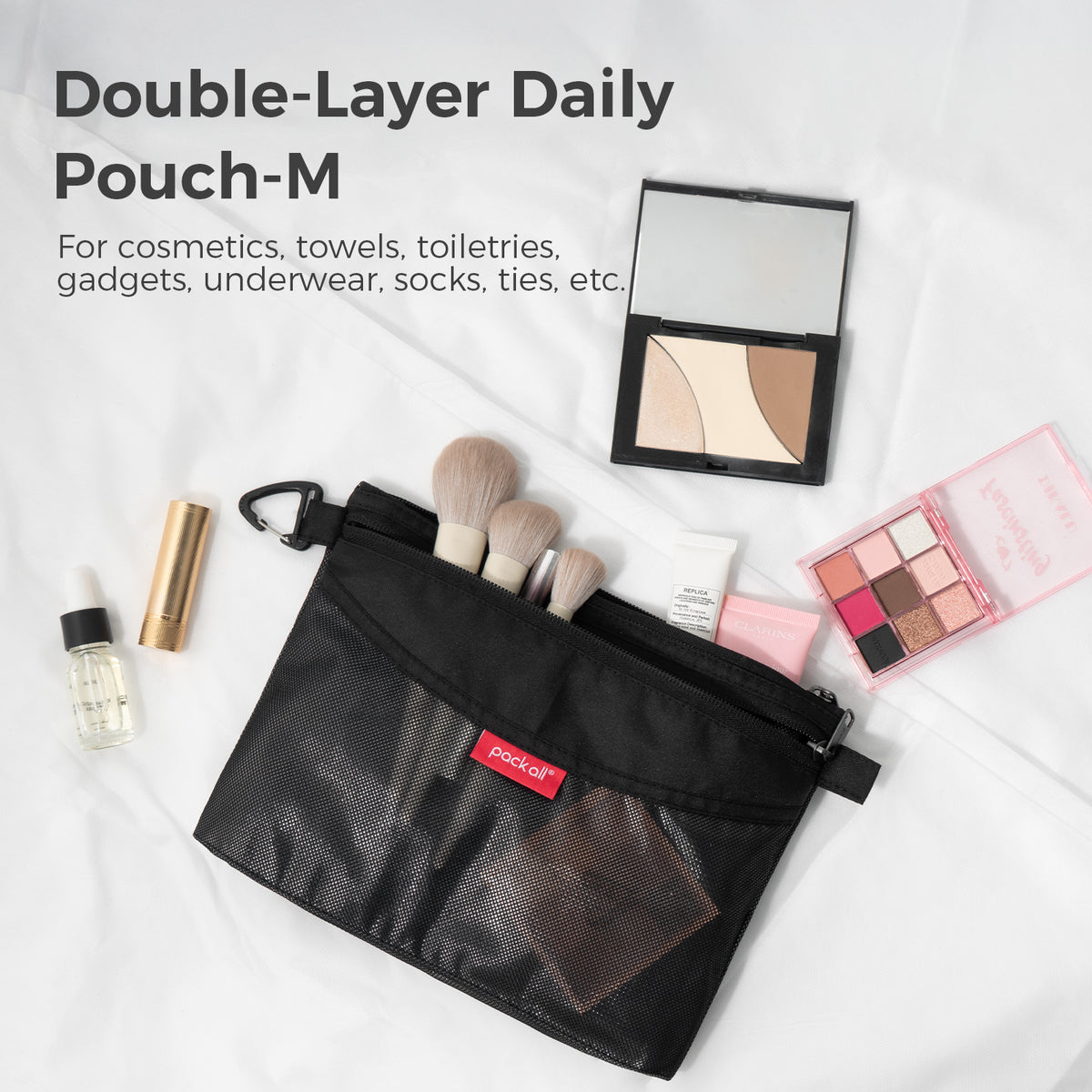 Keep cosmetics, grooming tools and toiletries together in the black medium pack all® double-layer daily pouch, with compartments for daily or travel use.