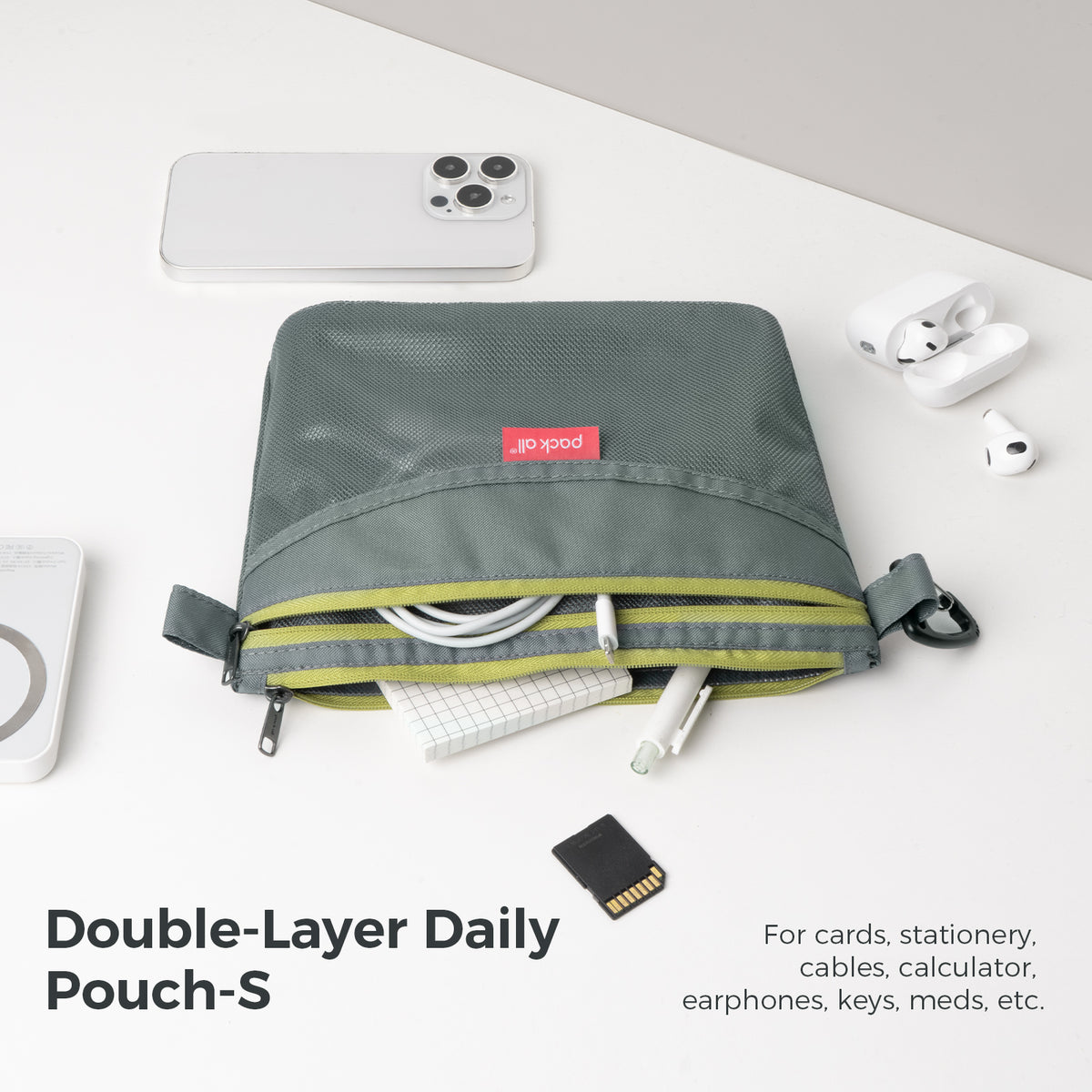 Organize cables, earbuds, a phone and other small daily accessories with the gray small pack all® double-layer daily pouch for work, school or travel.