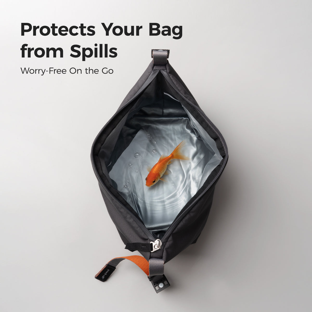 Open pack all® insulated lunch bag showing a silver PEVA liner with an illustrative water-and-goldfish visual to demonstrate spill containment.